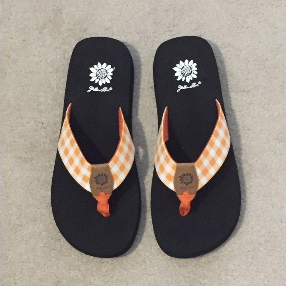 Yellow box flip flops